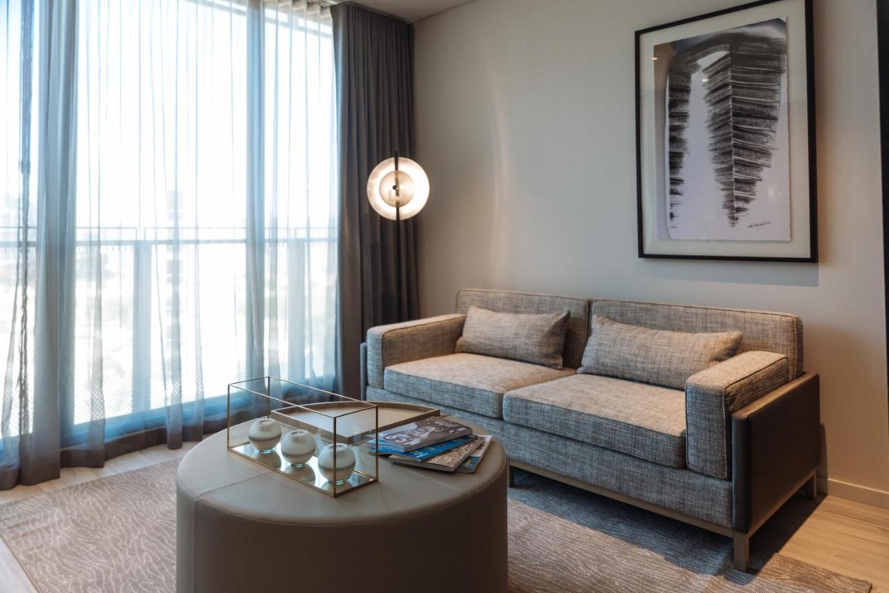 One Global Resorts Green Square Сидней Экстерьер фото A living room at The Ritz-Carlton, DIFC